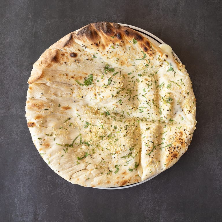 Savor our authentic naan